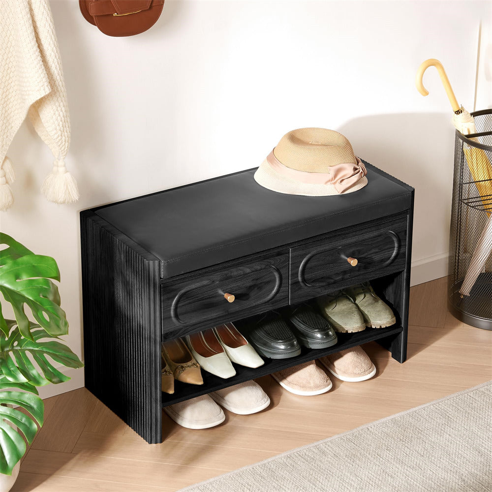 Black shoe bench with shoes and a hat in a room setting