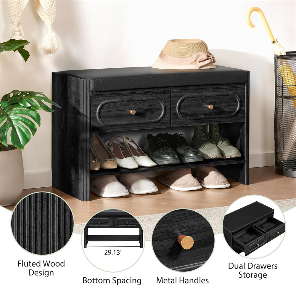 Black shoe cabinet with shoes inside, fluted wood design, metal handles, and dual drawers storage.