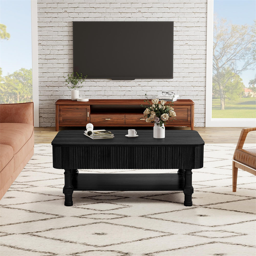 Living room with a black coffee table, wooden TV stand, and pink sofa.