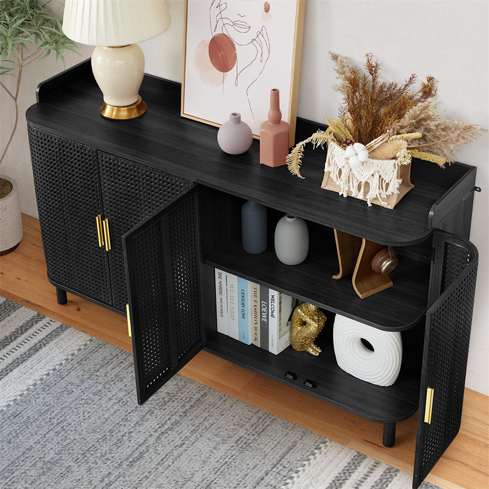Black woven console table with decorative items in a room setting
