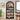 Black arch-shaped bookshelf with decorative items in a room with a window and plant.