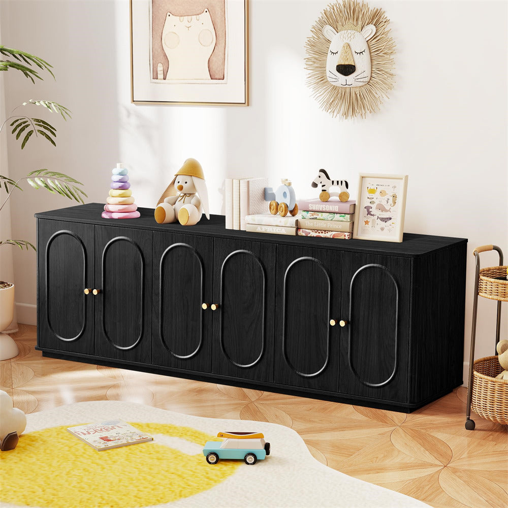 Black cabinet with decorative items in a room with toys and plants