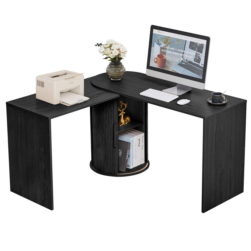 Black L-shaped desk with office items on a white background