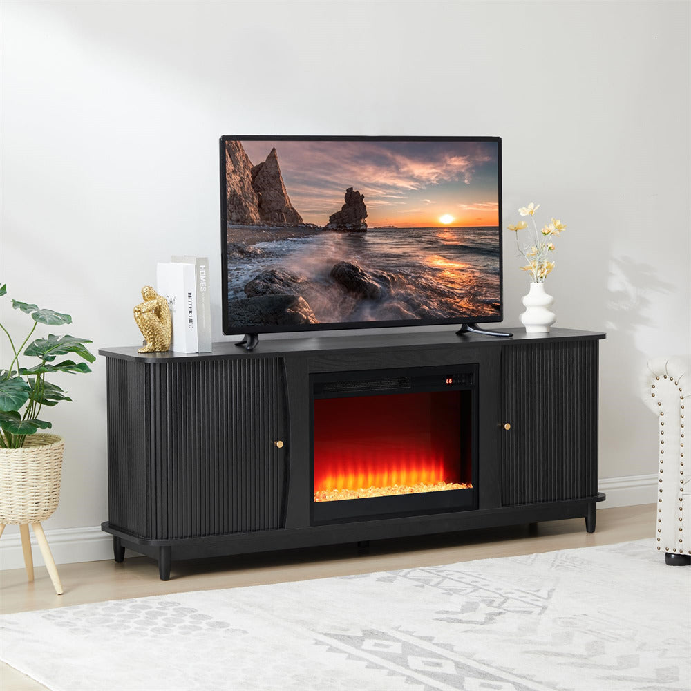 Black TV stand with electric fireplace displaying a scenic image on a television.