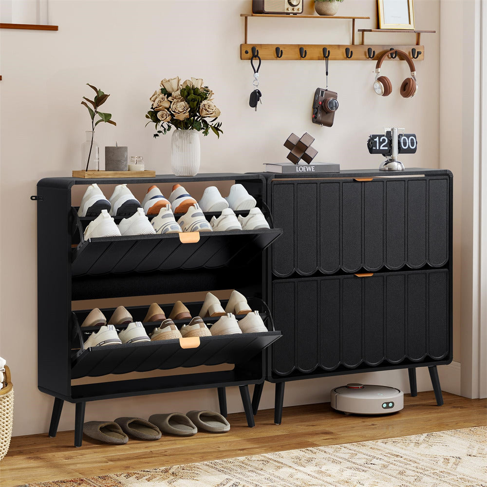 Black shoe rack with shoes on a wooden floor in a room setting.