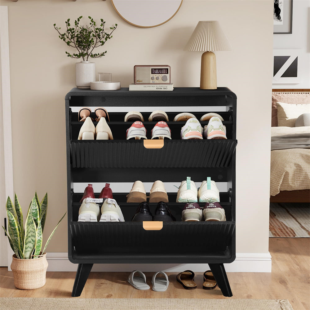 Black shoe rack with shoes on a wooden floor in a room setting.