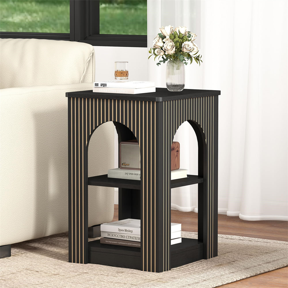 Black side table with bookshelves in a living room setting