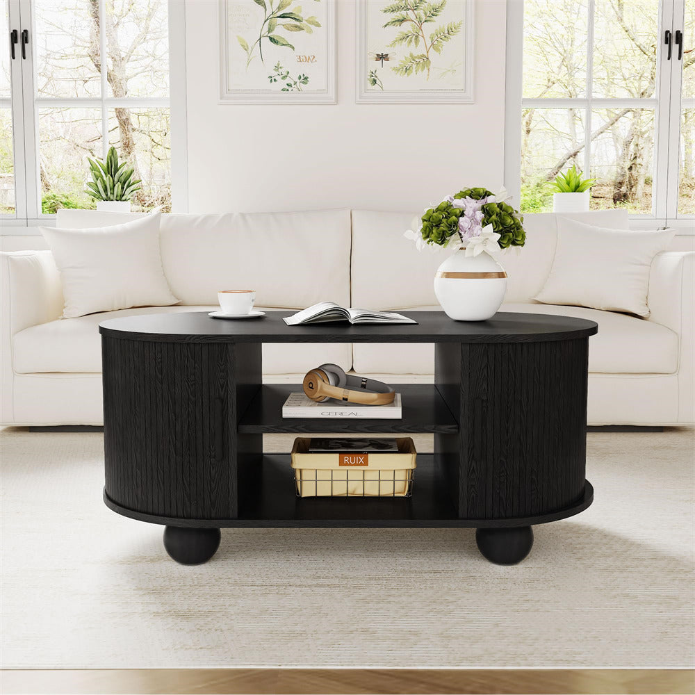 Black Mid-Century Modern Oval Fluted Coffee Table with Storage & Sliding Doors