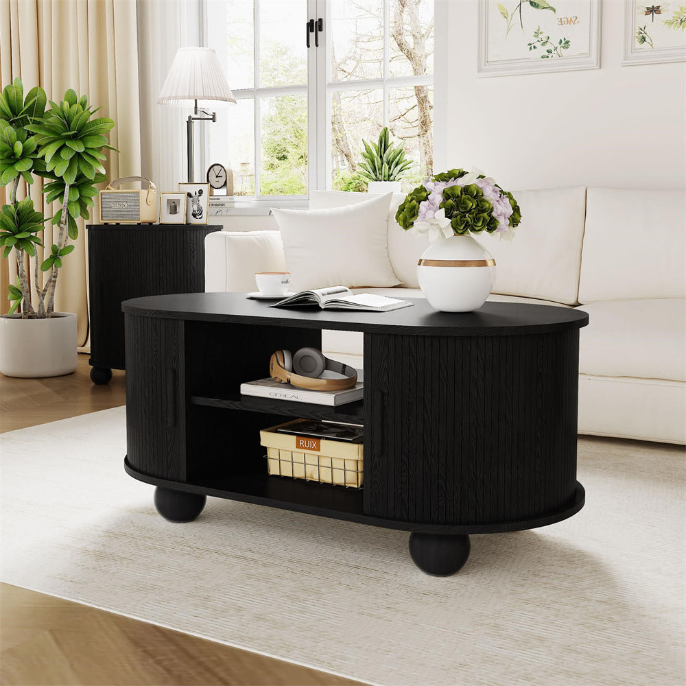 Black Mid-Century Modern Oval Fluted Coffee Table with Storage & Sliding Doors