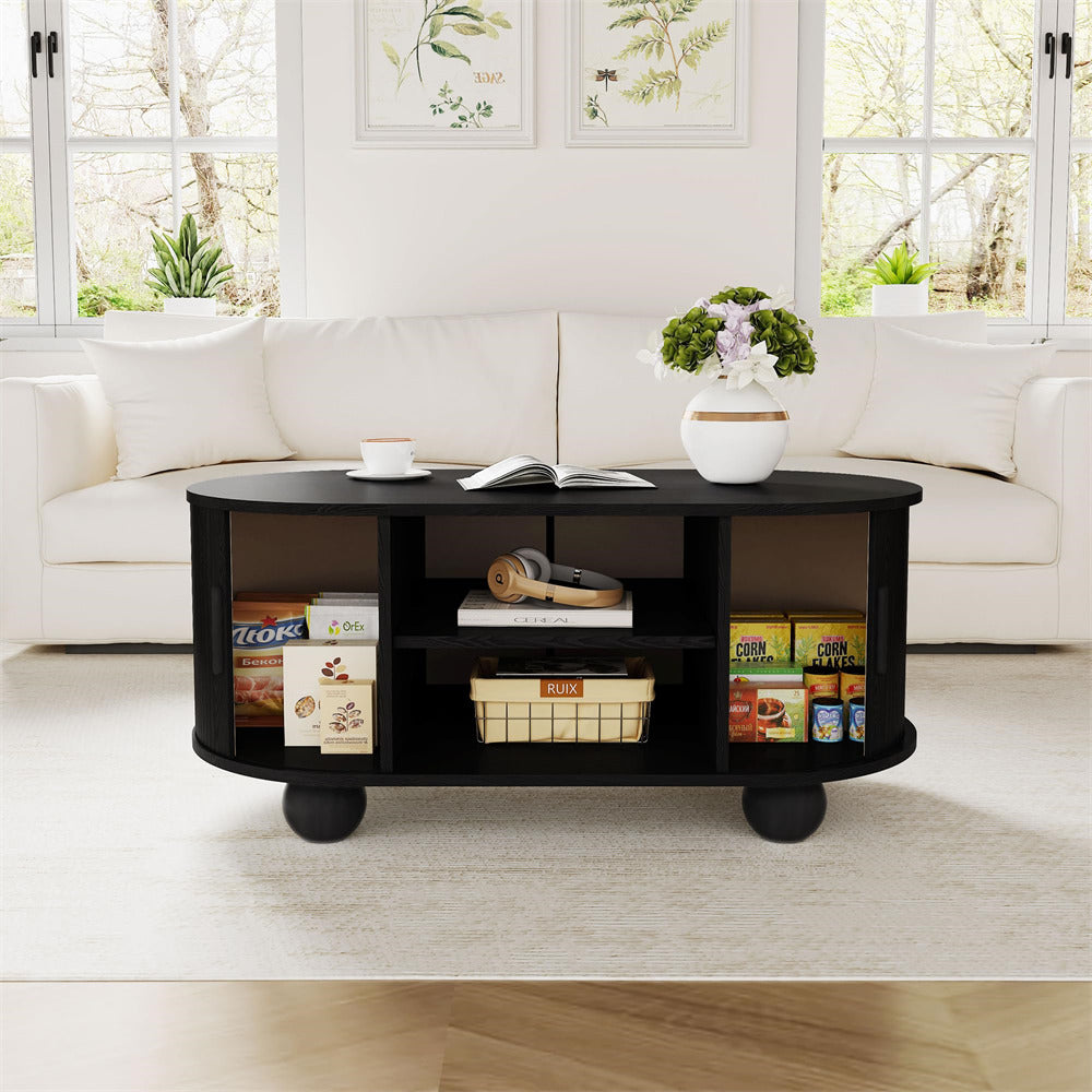 Black Mid-Century Modern Oval Fluted Coffee Table with Storage & Sliding Doors