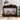 Black console table with decorative items including teddy bears, books, and a vase.