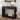 Black console table with decorative items in a living room setting