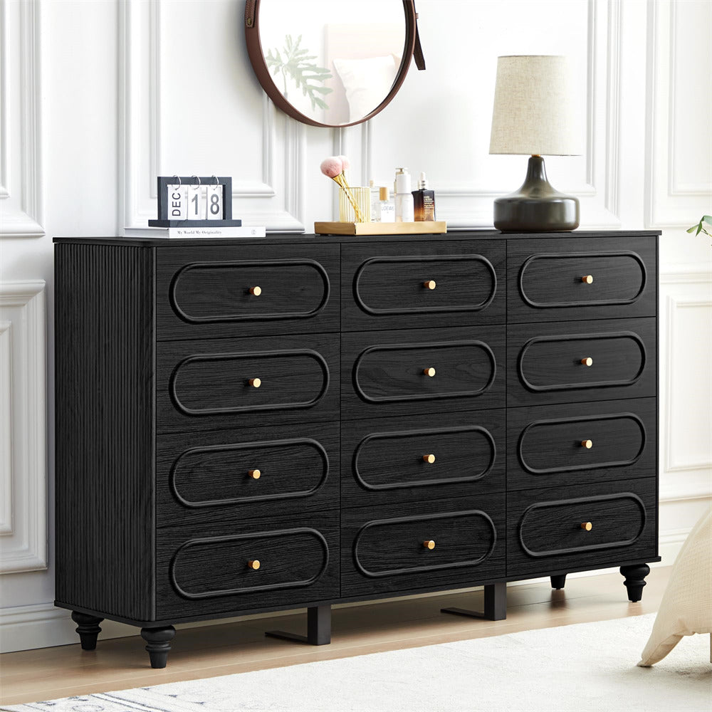 Black dresser with multiple drawers in a room setting