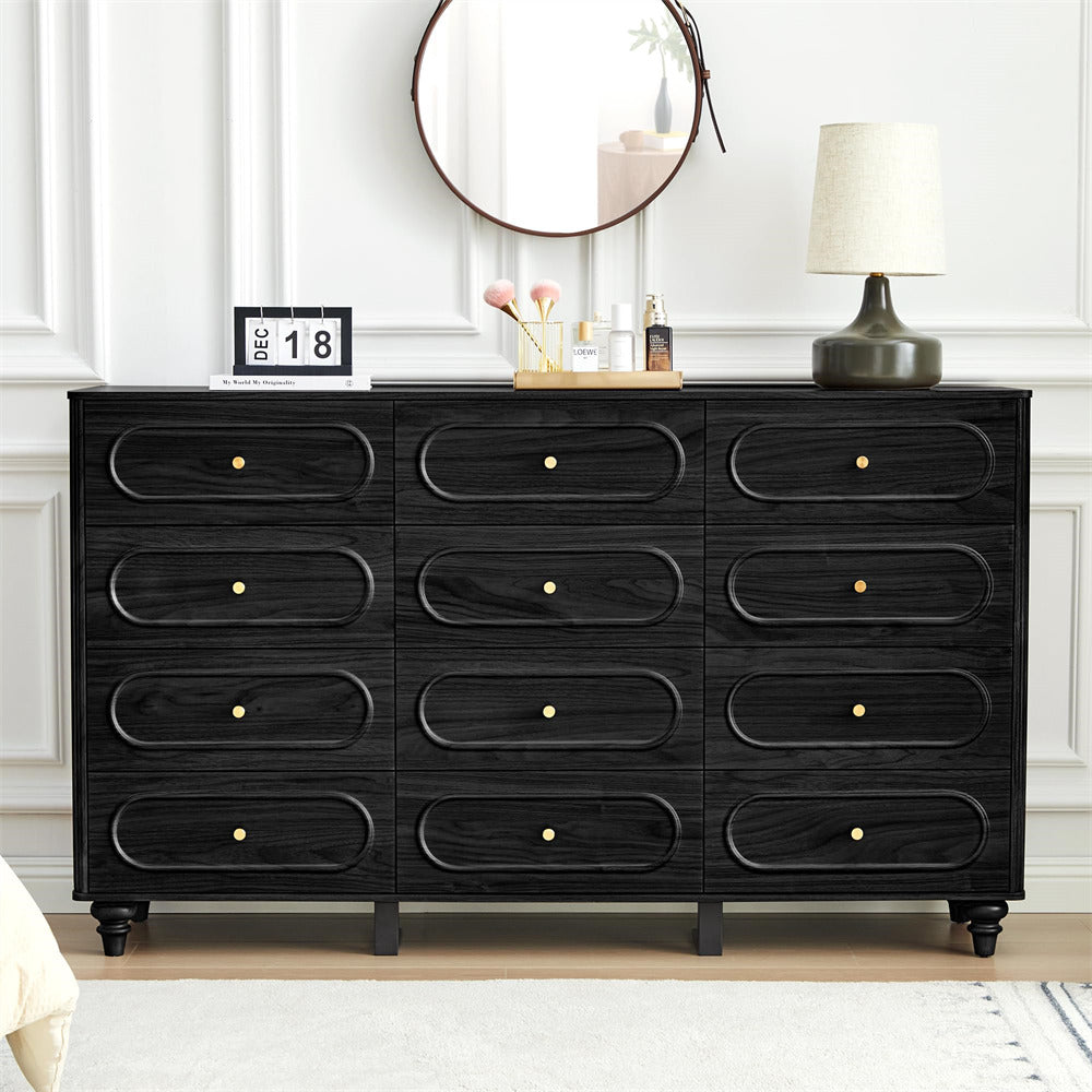 Black dresser with gold accents in a room setting