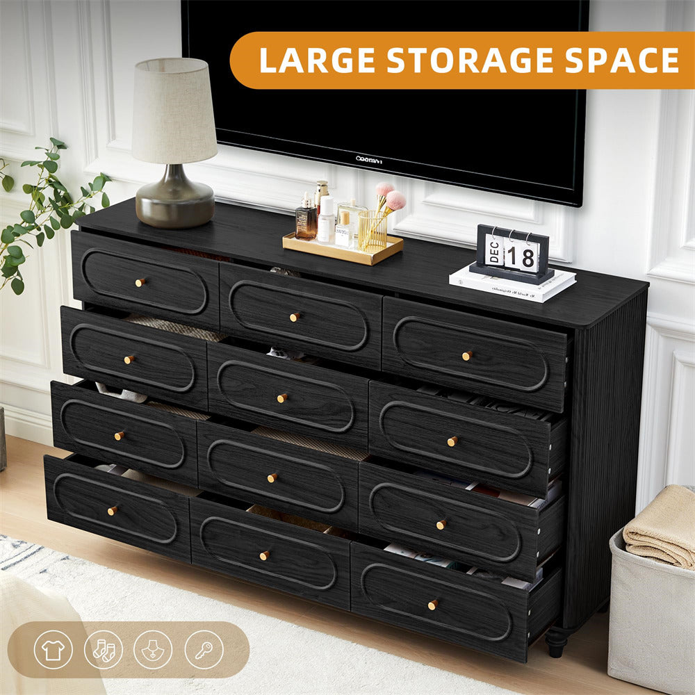 Black dresser with multiple drawers in a room setting, featuring decorative items on top.
