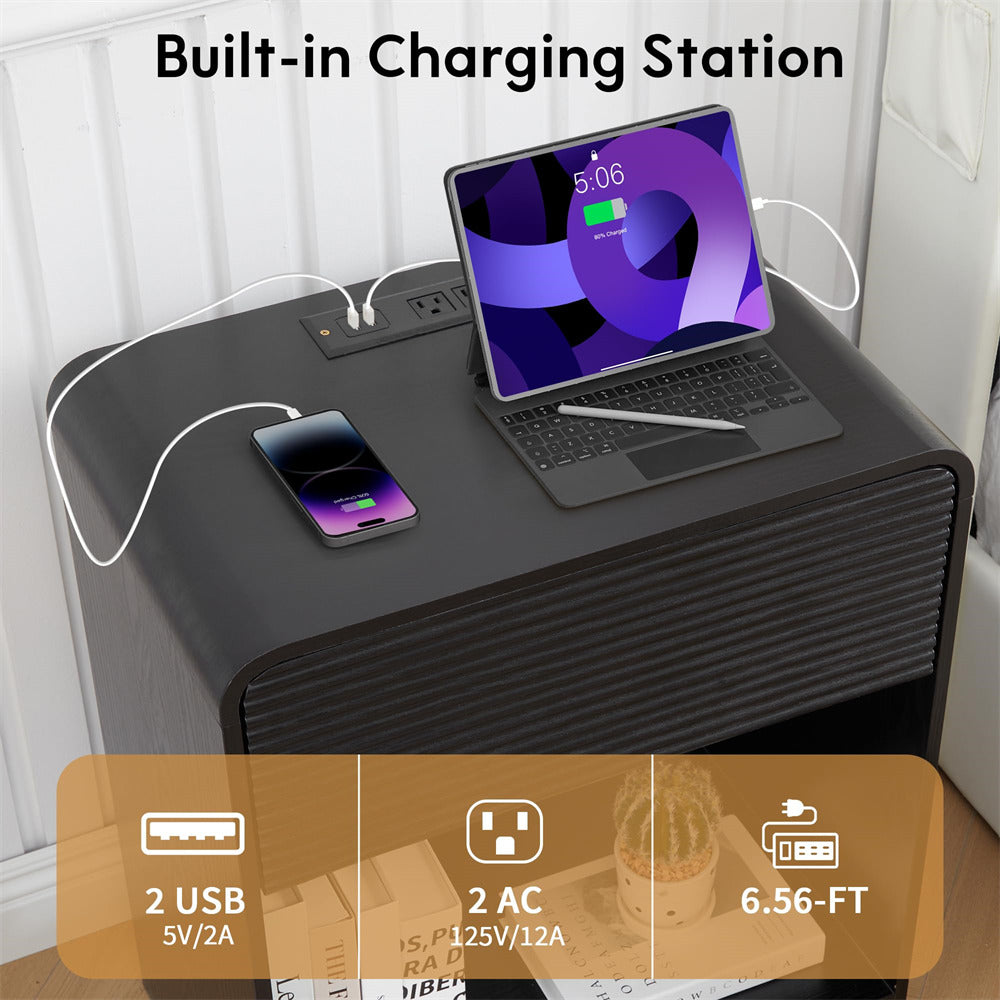Black charging station with laptop, phone, and power outlets on a white surface.