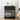 Black nightstand with decorative items in a bedroom setting