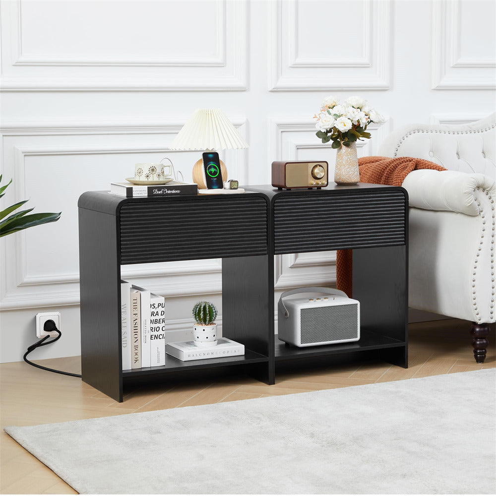 Black side table with shelves in a living room setting