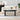 White sofa with a black coffee table in a living room setting