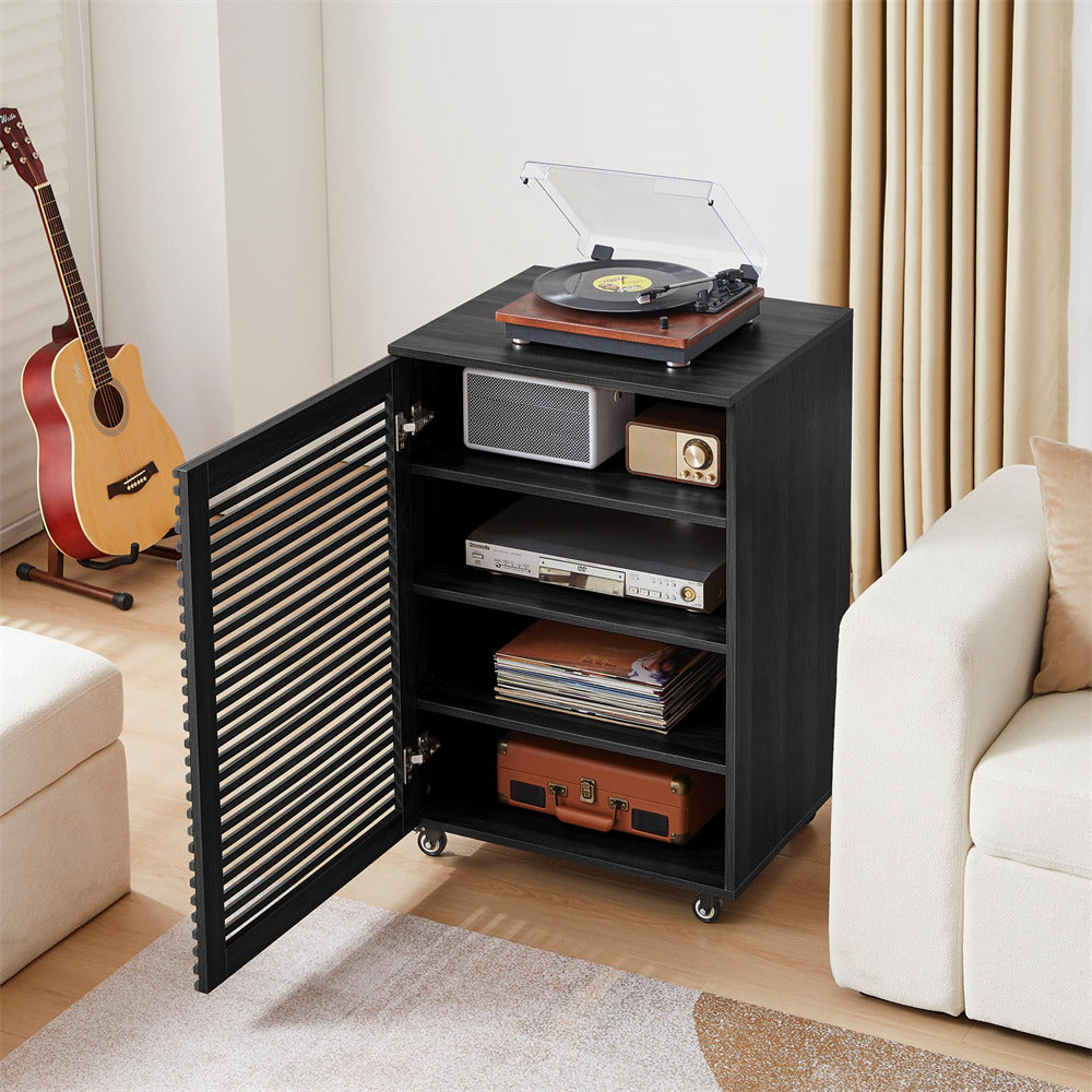 Black storage cabinet with open door in a living room setting with a guitar and sofa.