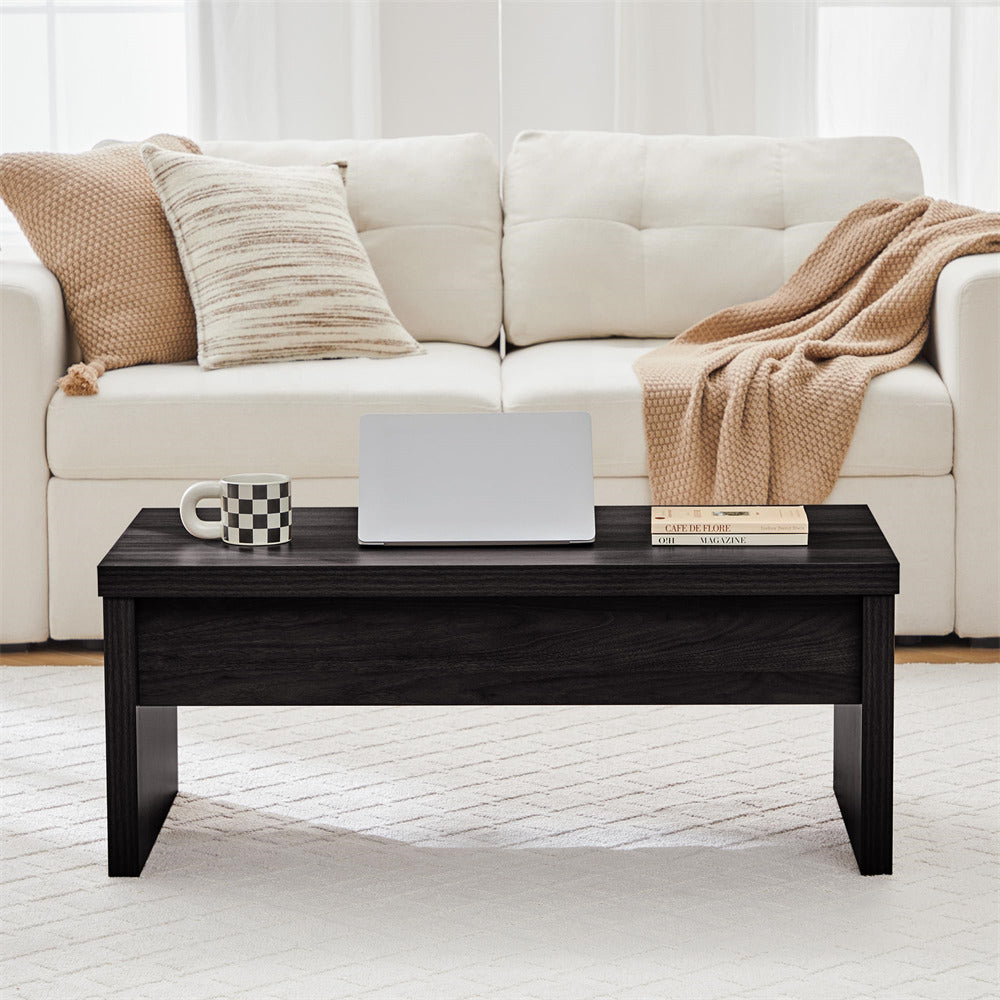 Living room with a beige sofa, coffee table, and decor items.