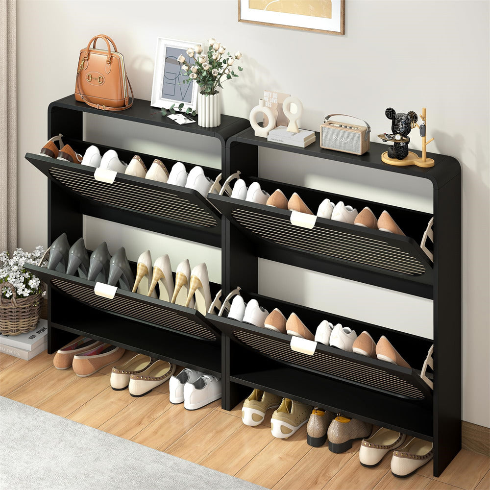 Black shoe rack with various shoes on a wooden floor.