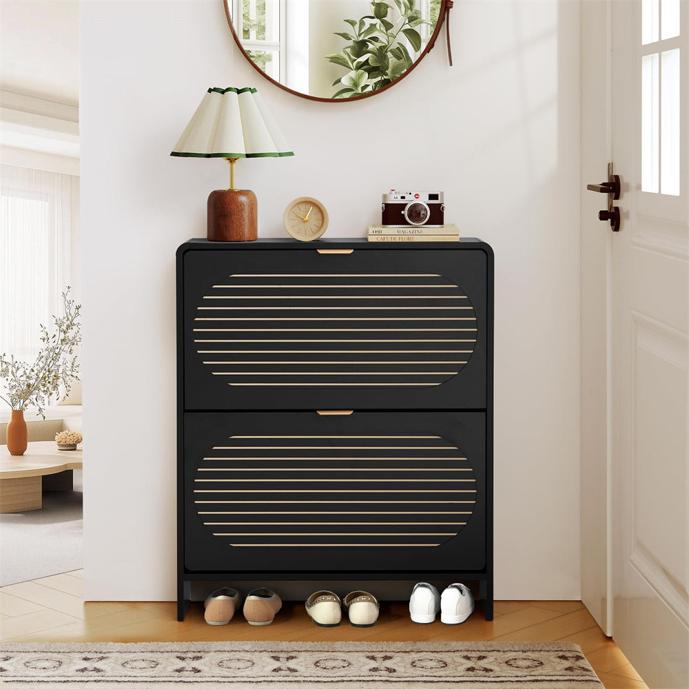 Black shoe cabinet with gold accents in a room setting