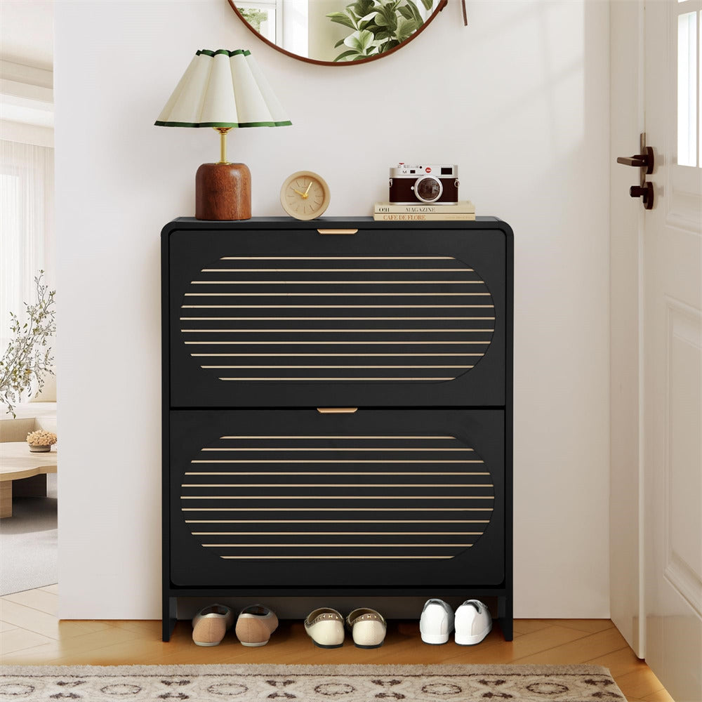 Black shoe cabinet with gold accents in a room setting