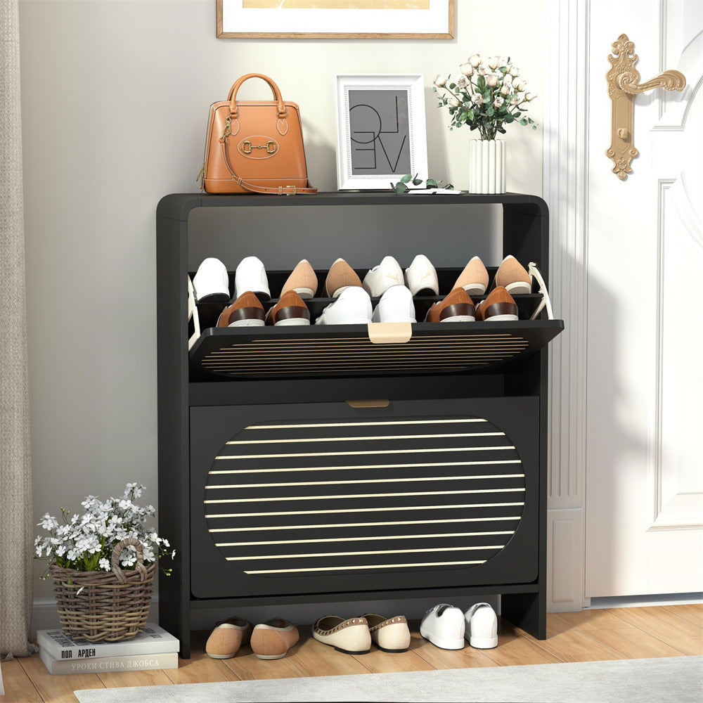 Black shoe cabinet with shoes on a wooden floor in a room.