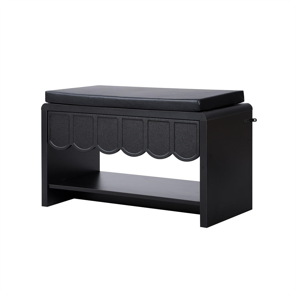Black storage bench with a cushion on a white background