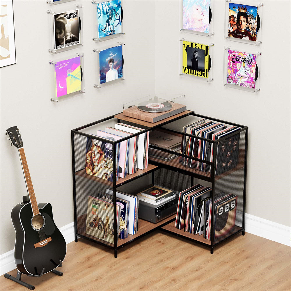 Vinyl record storage unit with records and a guitar in a room setting.