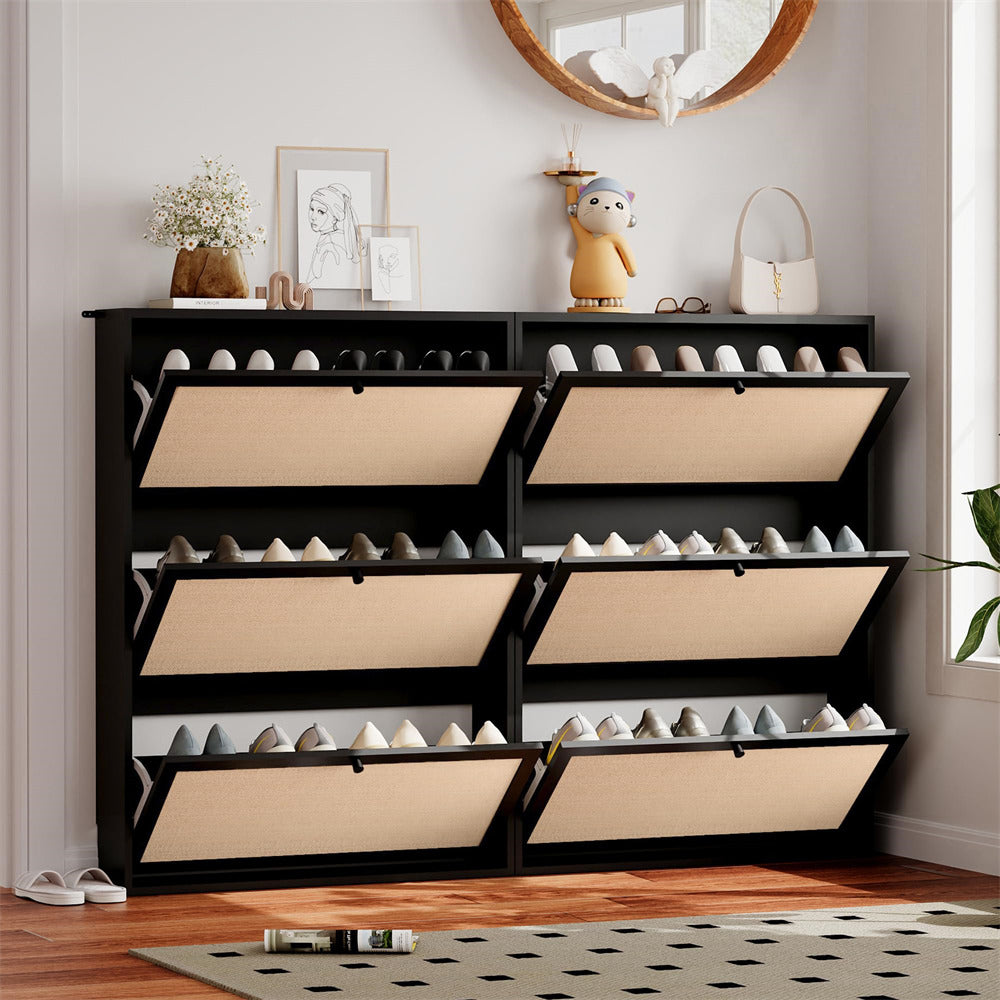 Black shoe rack with open drawers containing shoes in a room setting.