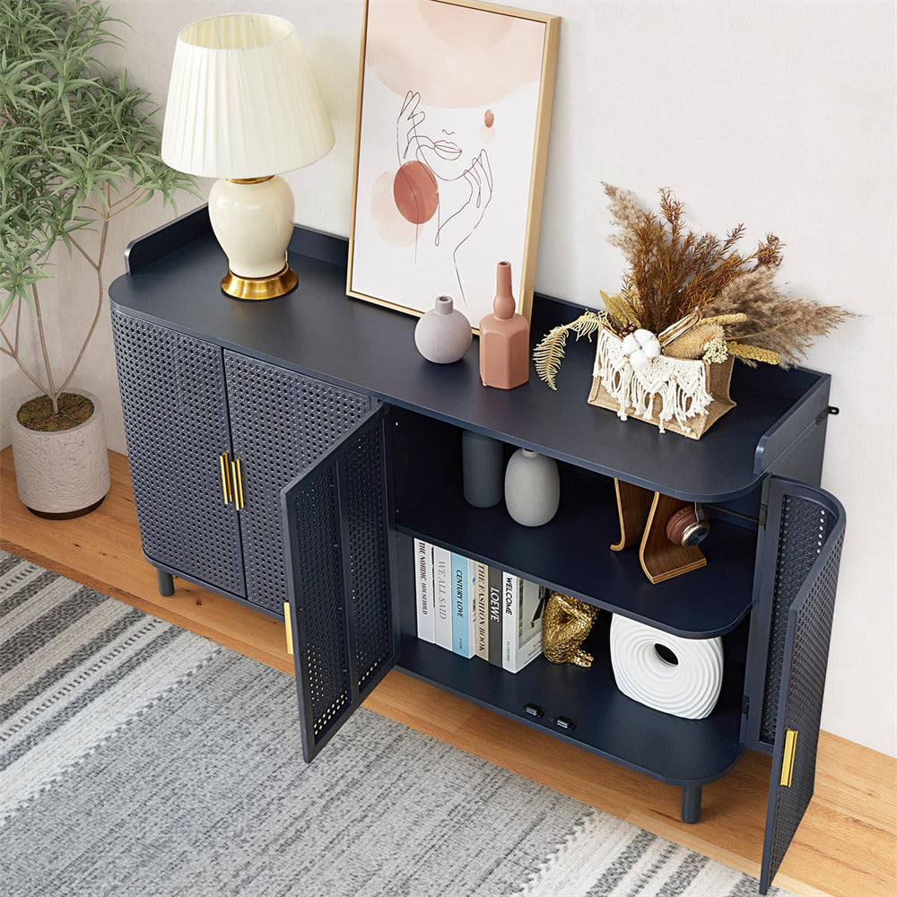 Dark blue cabinet with open door displaying decor items in a room with a lamp, plant, and artwork.