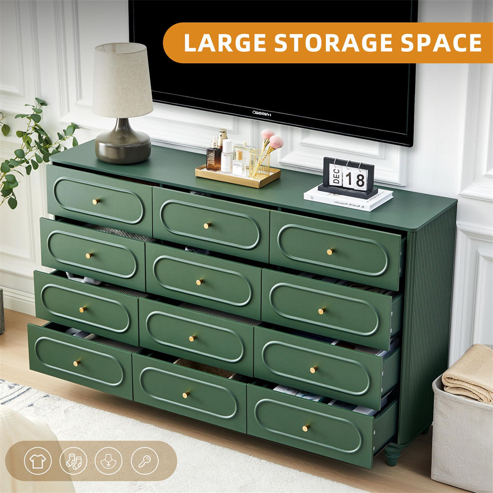 Green dresser with multiple drawers in a room setting, emphasizing large storage space.