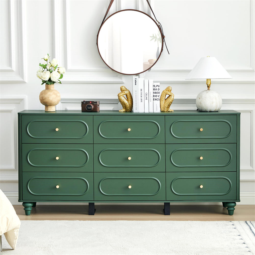 Green dresser with decorative items in a room setting