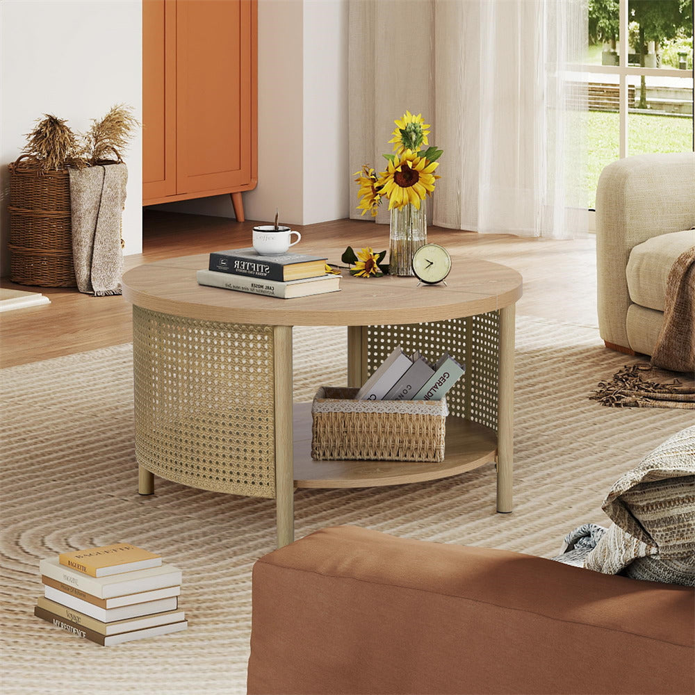 Round wooden coffee table in a living room with books, a clock, and sunflower decorations.