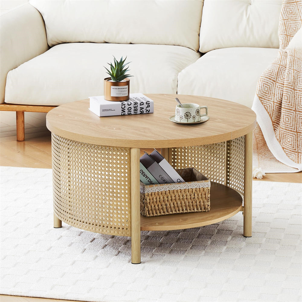 Round wooden coffee table with wicker base in a living room setting.