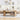 Living room with a white sofa, wooden coffee table, and decorative items.