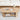 Wooden coffee table with decorative items in a living room setting