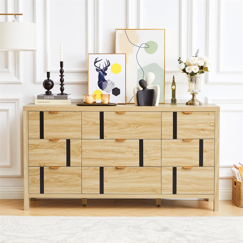 Wooden dresser with decorative items in a room with white walls and wooden floor.