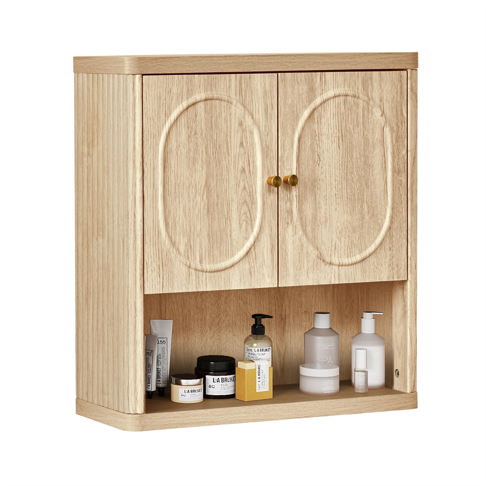 Wooden cabinet with oval-shaped doors and various bottles on a white background