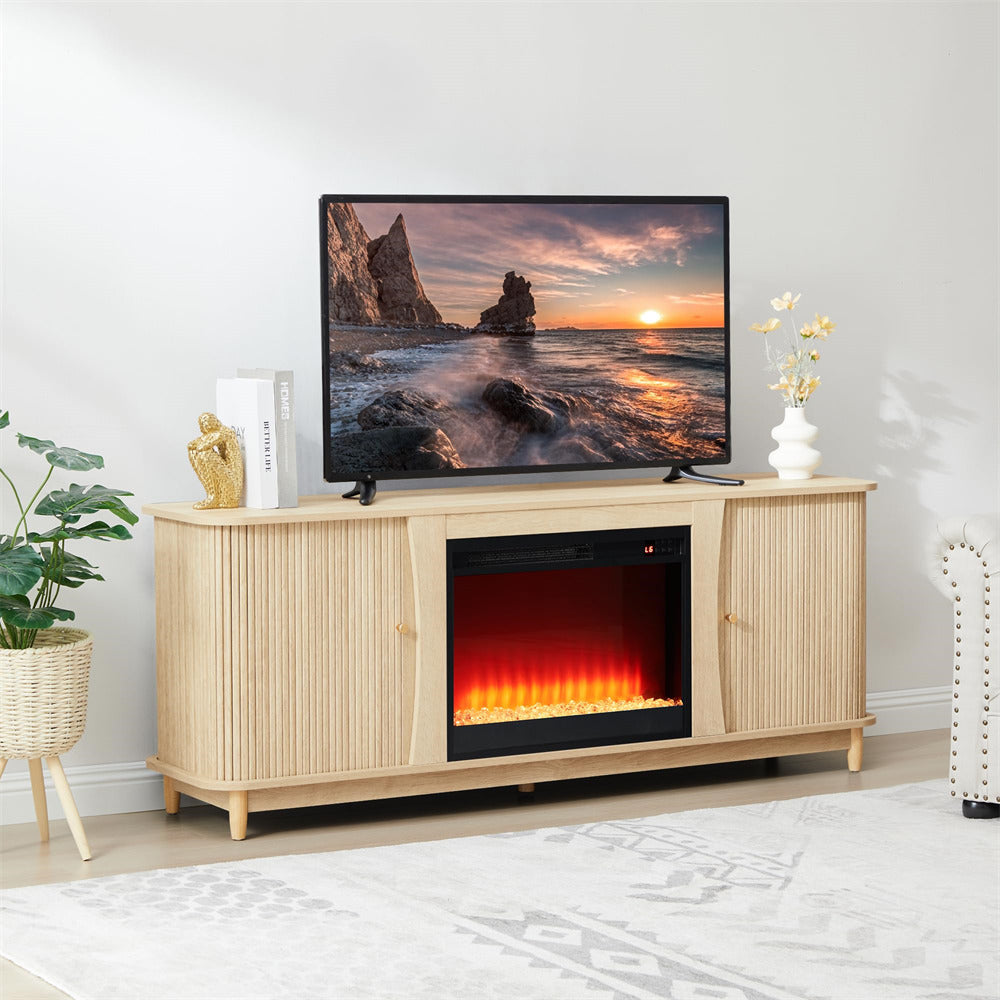 TV on a wooden stand with an electric fireplace display, surrounded by decor items.