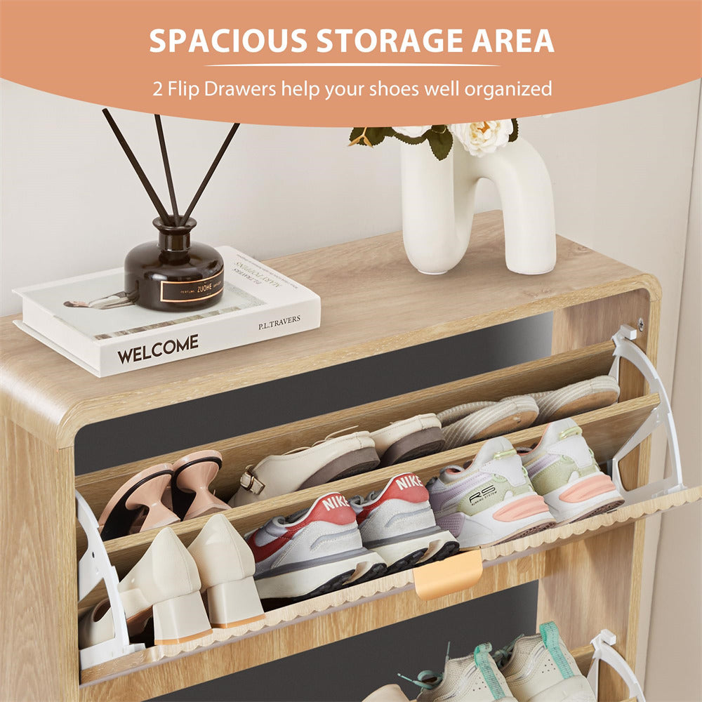 Wooden shoe rack with open drawers containing shoes, decorated with a vase and books on top.