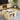 Natural Mid-Century Modern Oval Fluted Coffee Table with Storage & Sliding Doors