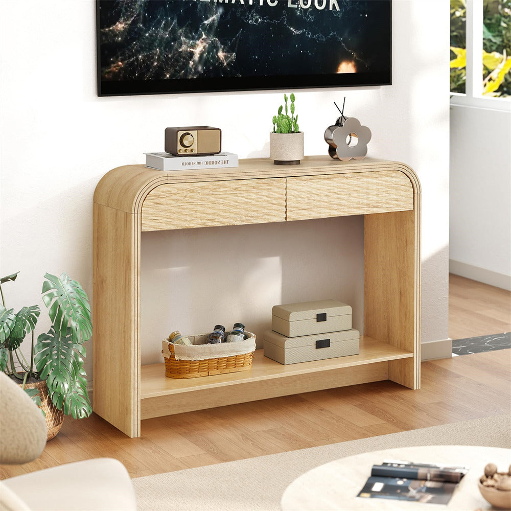 Wooden console table in a living room with decorative items and a TV above.