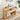 Wooden console table with drawers in a room setting