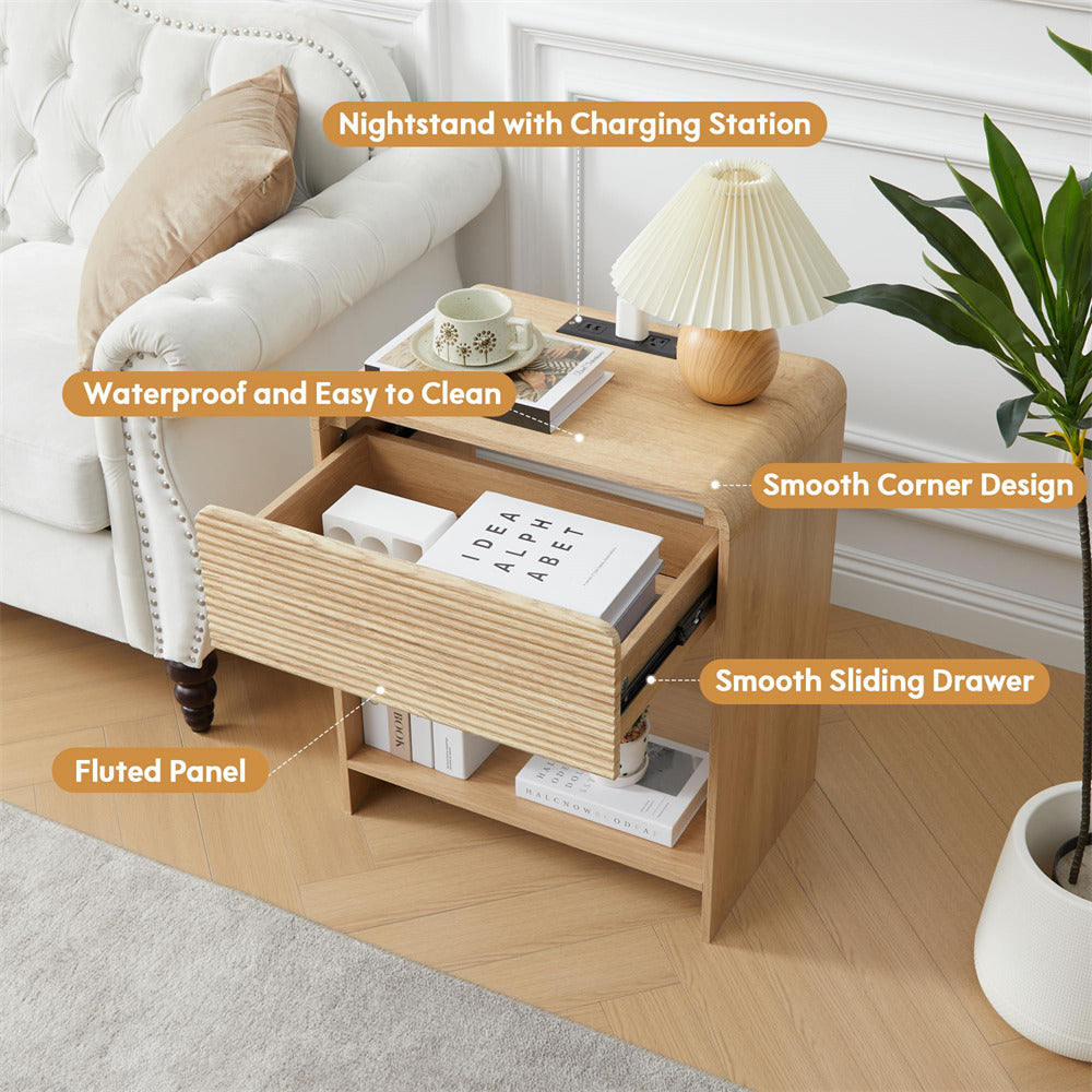 Wooden nightstand with charging station in a living room setting