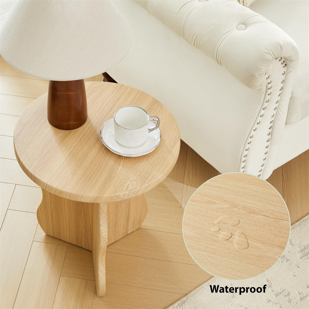 Wooden side table with a cup and saucer next to a white sofa, with a close-up of the table's surface showing 'Waterproof' text.