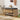Wooden shoe storage bench with open compartments, shoes, and bags in a room setting.
