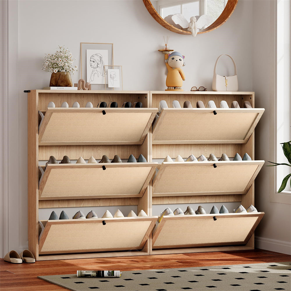 Wooden shoe cabinet with open drawers filled with shoes in a room setting.